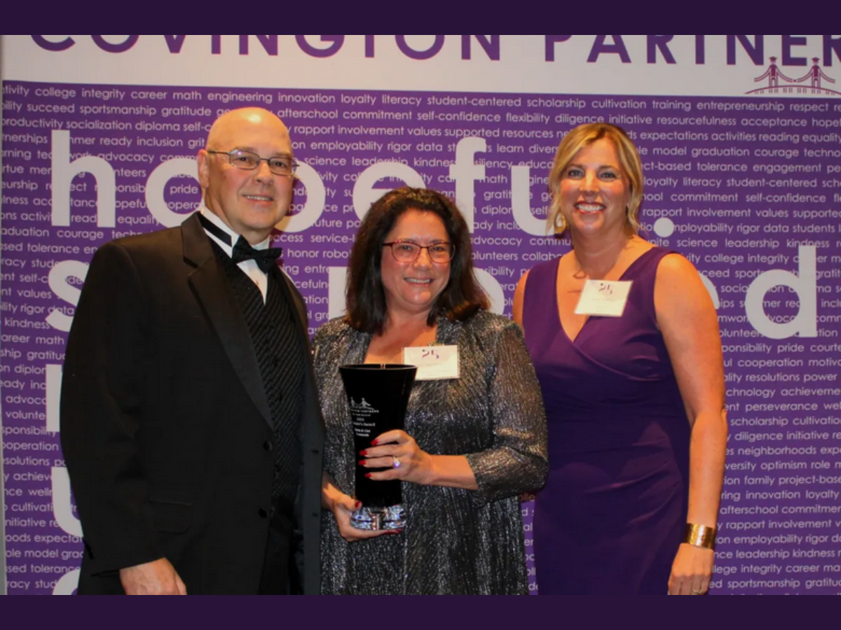 Untitled design - 1 Stacie Strotman and Lisa Desmarais standing with award