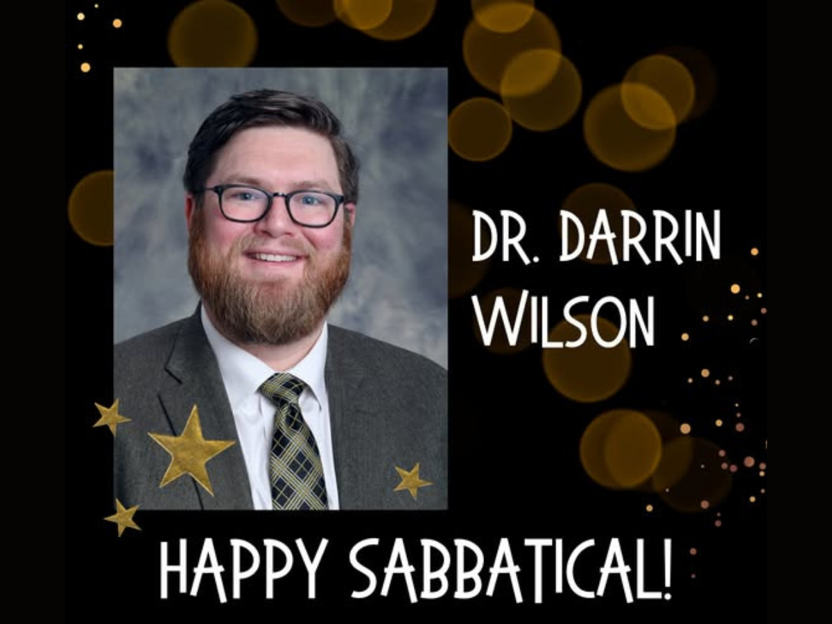 Untitled design - 1 Dr. Darrin Wilson headshot with a "Happy Sabbatical" message