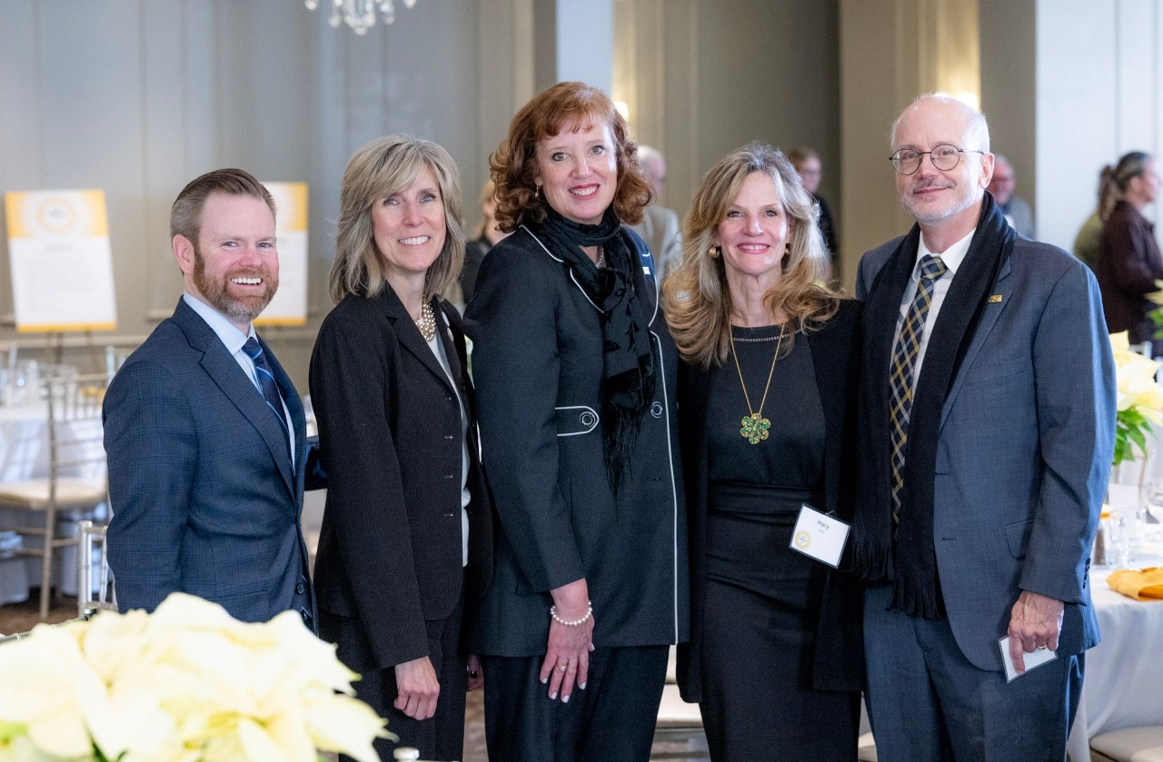 President Cady Short-Thompson stops for a picture with Eric Gentry, Barb Johnson, Mary Zappa, and Kevin Kirby at the CST Circle launch luncheon.