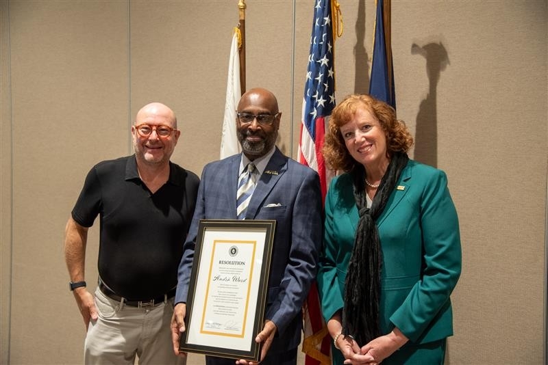 NKU BOR Chair Nathan Smith (left) and President Cady Short-Thompson (right) stand with regent Andra Ward. 