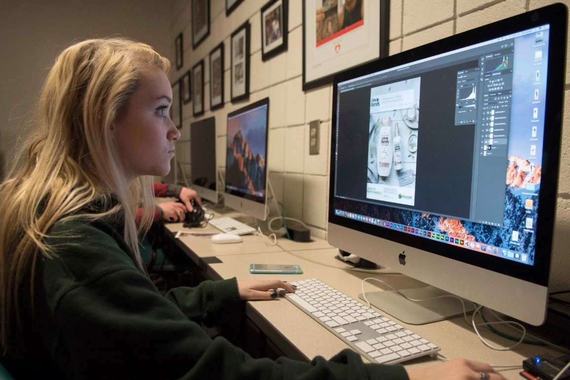 student working in a computer lab